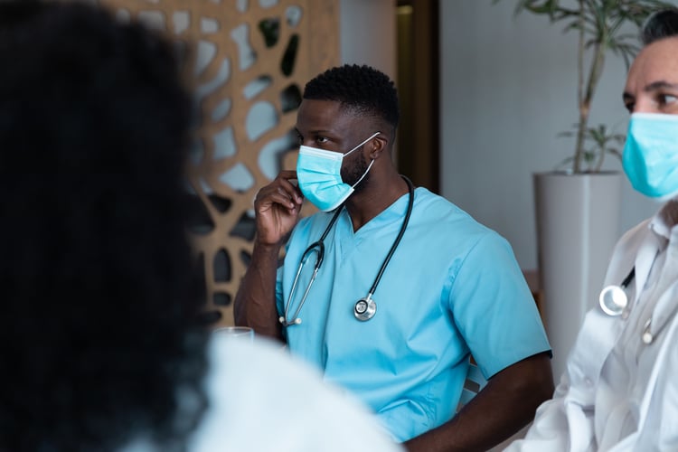 diverse-male-and-female-doctors-wearing-face-masks-2023-11-27-04-52-56-utc