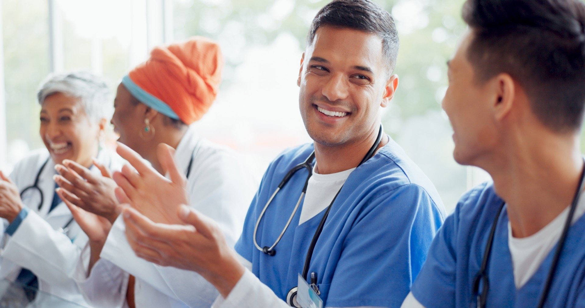 healthcare-meeting-and-applause-with-a-doctor-man-2023-11-27-05-02-26-utc