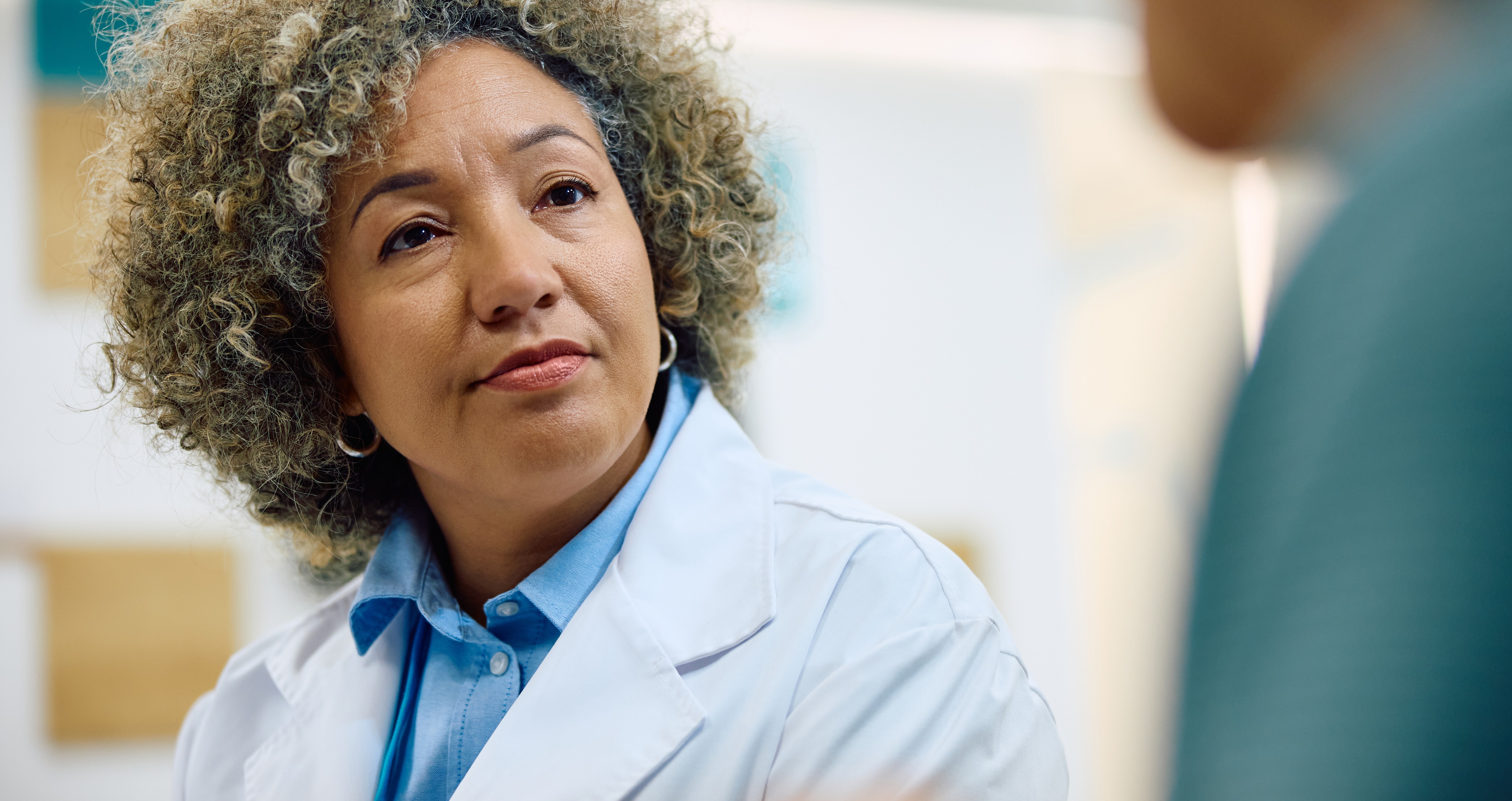 black-female-doctor-communicating-with-a-patient-i-2026-01-06-10-26-46-utc-1